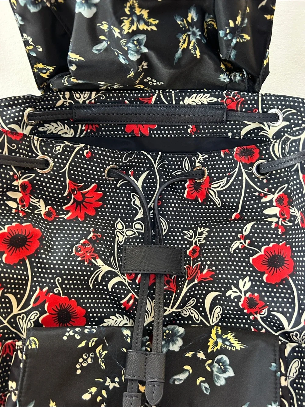 Tory Burch Black Floral Drawstring Backpack with Red and Cream Blooms